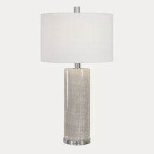 Load image into Gallery viewer, Table lamp with a white shade and textured cylindrical base on a white background