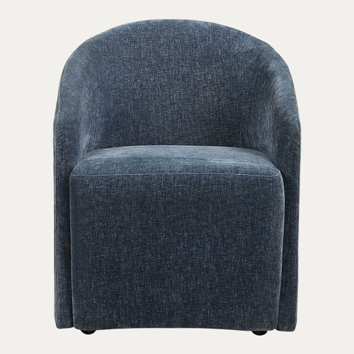 Blue upholstered chair on a white background