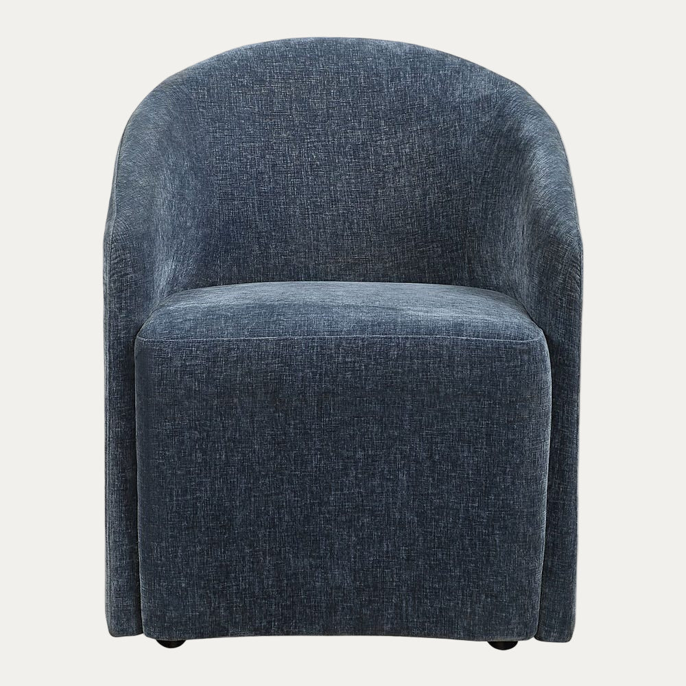 Blue upholstered chair on a white background
