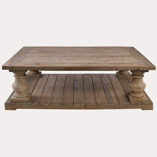 Wooden coffee table with a rustic design on a white background