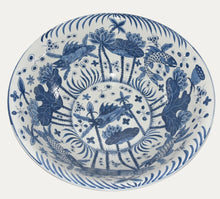 Load image into Gallery viewer, Blue and white ceramic plate with fish and lotus design on a white background
